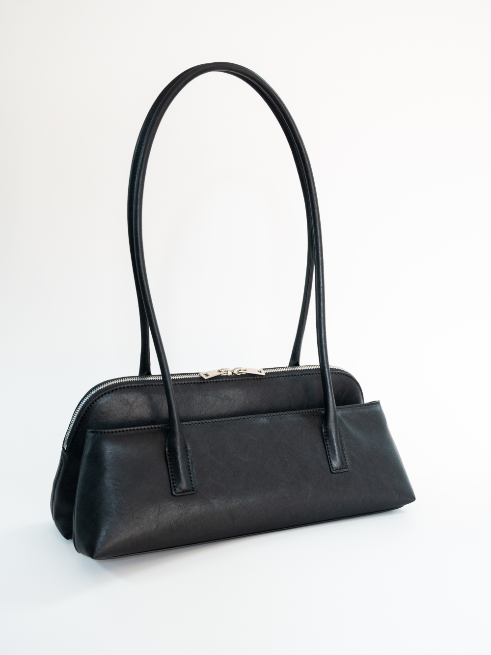 Eco-friendly and stylish: The melanin leather tote leads a new trend in urban commuting with its 'lightweight, durable, minimalist aesthetic'.